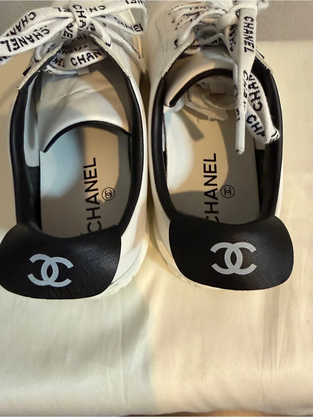 CHANEL White Leather Weekender Tennis Sneakers